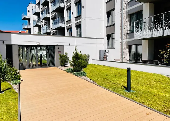 Nadmorskie Tarasy Pink&blue - C215 Sea&sun Апартаменты Колобжег